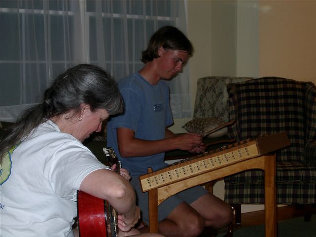 My "whiz kid" dulcimer student, Nick Gregg, backed up on guitar by his teacher! Nick started playing when he was 10; here, he'd just graduated high school. (Now he's in residency training to be a doctor.) And boy, can he play! (photo by Sarah Gregg)